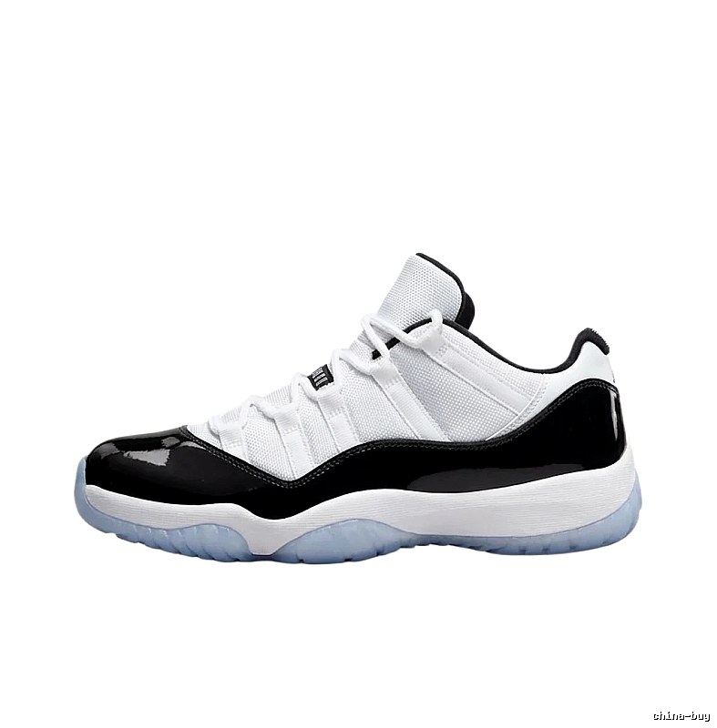Black and white fashionable Air Jordan 11 sneakers.