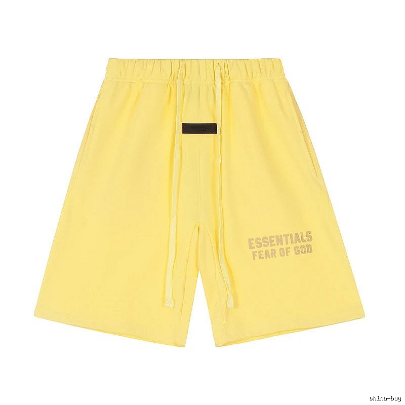 ESSENTIALS minimalist style yellow shorts
